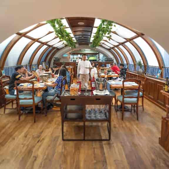 Corporate incentive dinner at Cappuccino’s Cafe, Millennium Plaza: barrel-vaulted event venue.