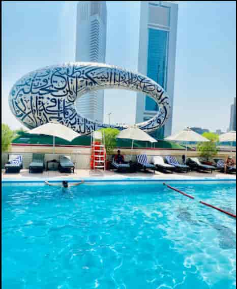 Pool Lounge at Millennium Plaza Dubai: rooftop venue with Museum of the Future view for events.