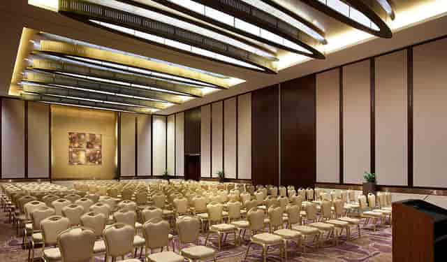 Swissotel Al Ghurair ballroom with theater-style seating for corporate conference and event venue.