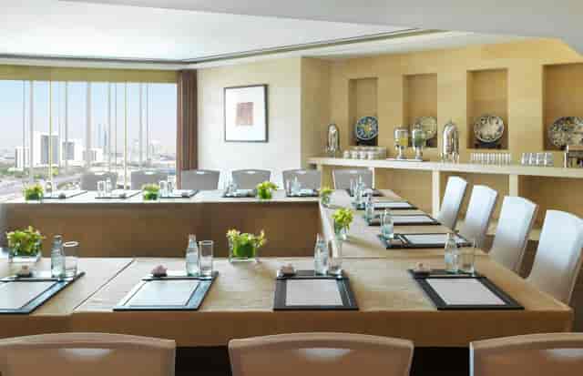 U-shape boardroom at Raffles The Palm Dubai with city views for corporate meetings and events.