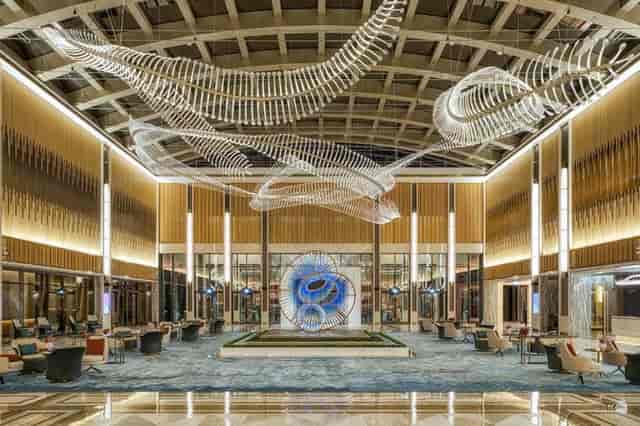 Upscale Aqua lobby at Taj Exotica, perfect for luxury corporate events and networking receptions.
