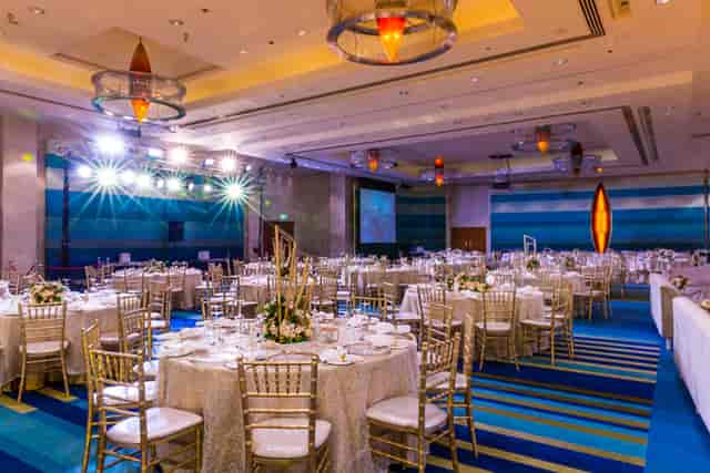 Gold Chiavari chairs in Meyana Auditorium gala setup for premium banquet events.