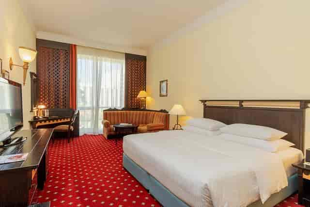 Executive suite at Millennium Airport Hotel Dubai for VIP business meetings and corporate events.
