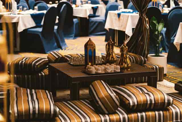 Zabeel Ballroom lounge setup with traditional floor seating for culturally rich networking events.