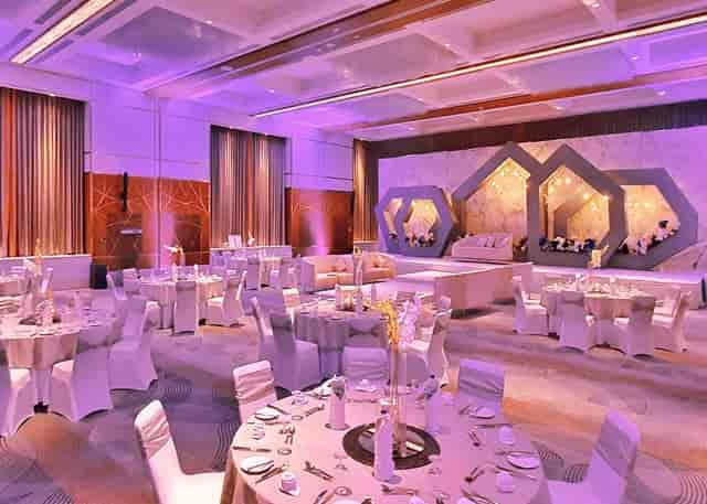 Grand Ballroom with purple lighting, ideal for luxury wedding and gala event staging.