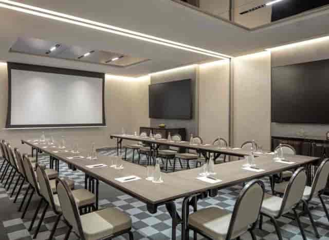 U-shape boardroom setup at The Agenda conference center for professional business meetings.