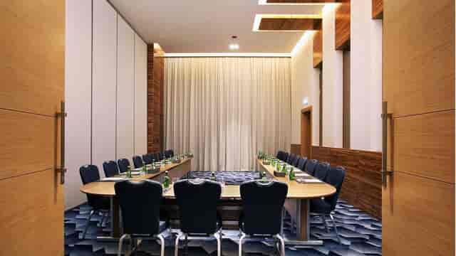 U-shaped boardroom at Radisson Blu Dubai Media City for corporate meetings and executive events.