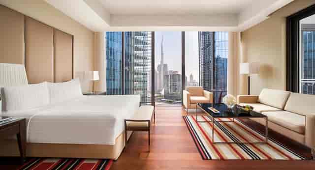 Executive suite with meeting area at Anantara Downtown Dubai for luxury business travel.