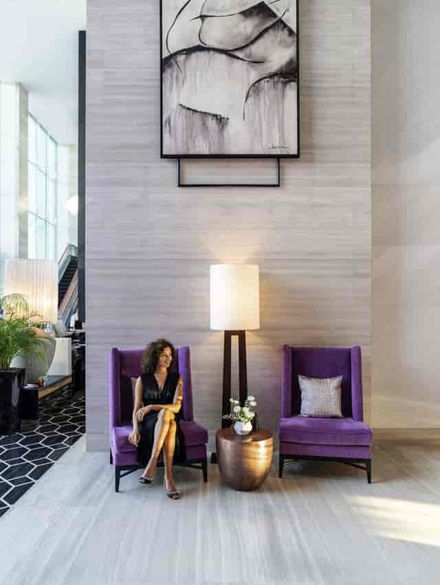 Pullman Dubai hotel lounge with purple seating for corporate breakout sessions and networking.