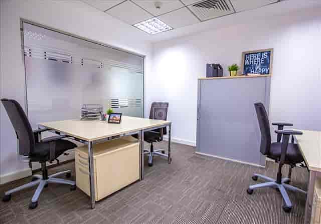 Private OneSpace interview room for focused coworking and professional consultations.