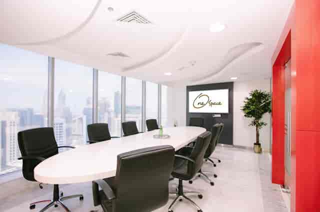 Boardroom-style meeting room with city views for executive corporate events and business meetings.