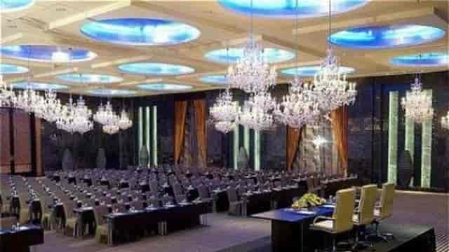Schoolroom setup in Oud Metha ballroom with chandeliers, ideal for corporate events and conferences.