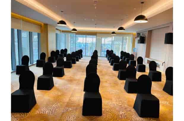 Wyndham Dubai Deira theater-style conference room with black seating for corporate events.