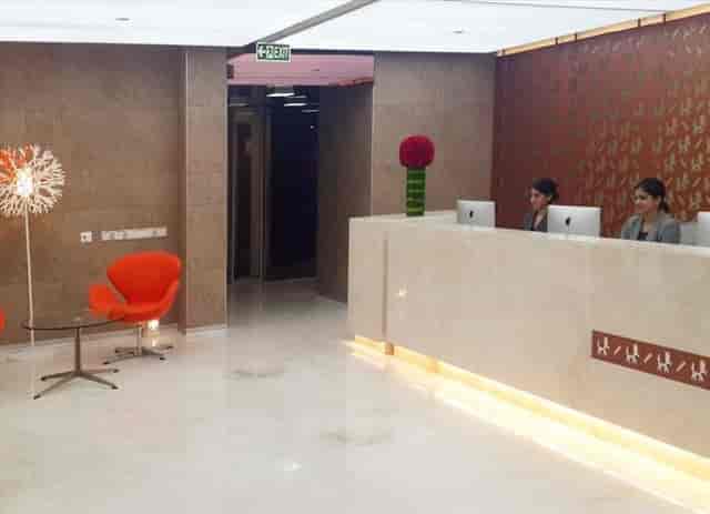 Modern check-in desk at Salarpuria Knowledge City corporate event venue for registration.