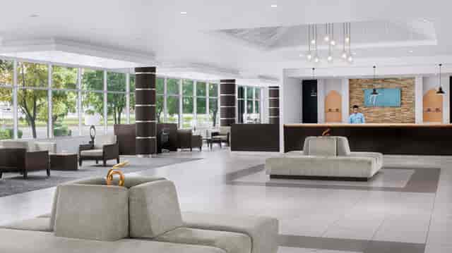Meeting Room 3: Modern hotel event space with modular seating for professional conferences.