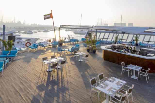 QE2 Yacht Club deck waterfront venue for upscale corporate cocktail and networking events.