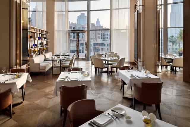 The Restaurant at Address Downtown with floor-to-ceiling windows for corporate or VIP dining.
