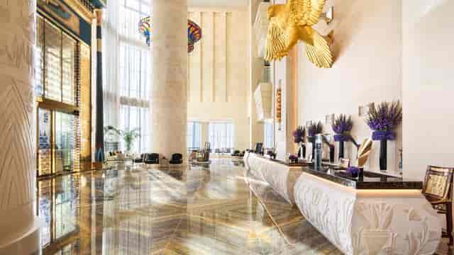 Luxury Egyptian-themed hotel lobby for grand corporate events and hotel registration.
