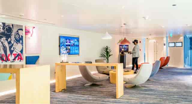 Modern 7 Squared breakout space with VR immersion for corporate networking and tech events.