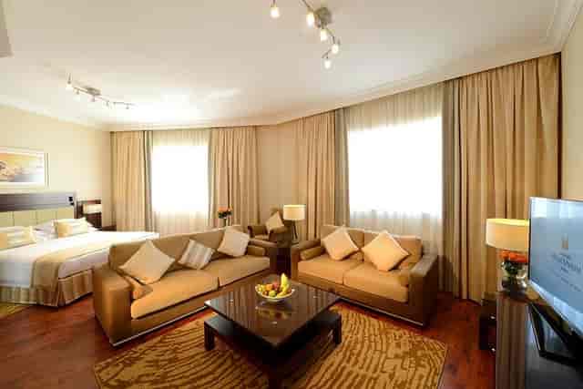 Spacious Grand Millennium Dubai suite for VIP executive meetings and corporate events.