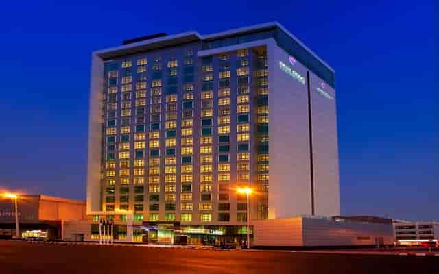 Park Regis Kris Kin hotel exterior: modern venue for corporate conferences and large events.