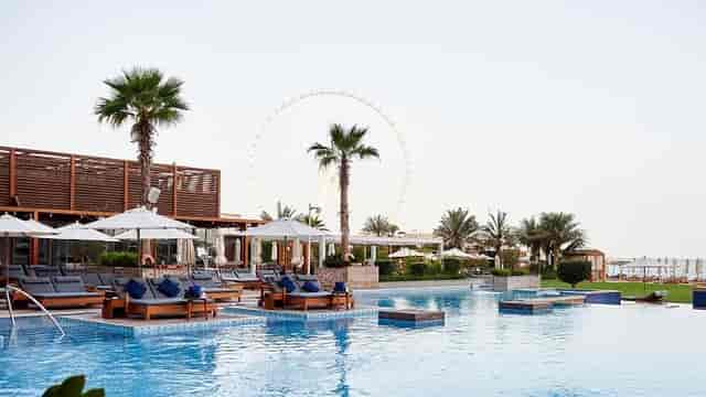 Azure Beach Dubai resort poolside lounge for VIP networking and incentive trip sunset mixers.