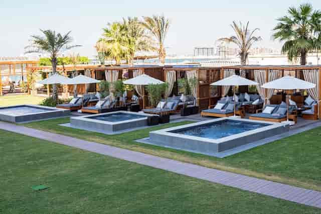 Private cabana with plunge pool for VIP hospitality and corporate networking events.