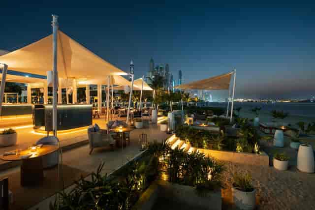 Upscale Beach Restaurant Dubai: dramatic evening reception venue with iconic skyline views.