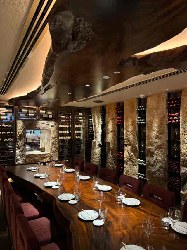 Intimate private dining room at Wine and Sake Cellars Dubai for executive dinners and VIP events.