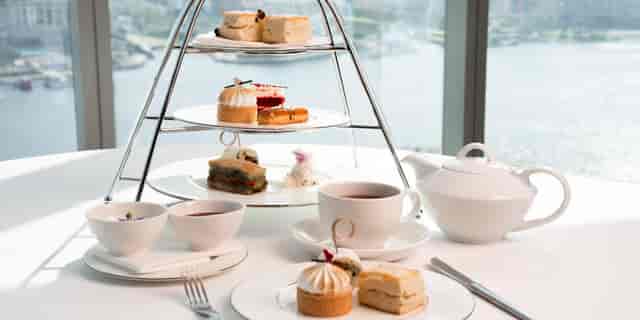 High-rise afternoon tea at InterContinental Dubai for corporate networking and business meetings.