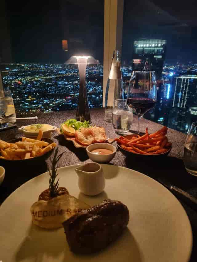 Prime68 Steakhouse dining room with panoramic views, perfect for executive dinners and events.