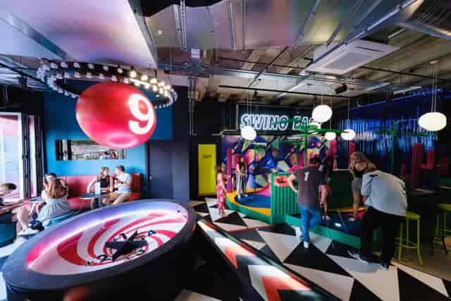 Birdies Angel mini-golf venue: vibrant space for corporate team building and networking events.