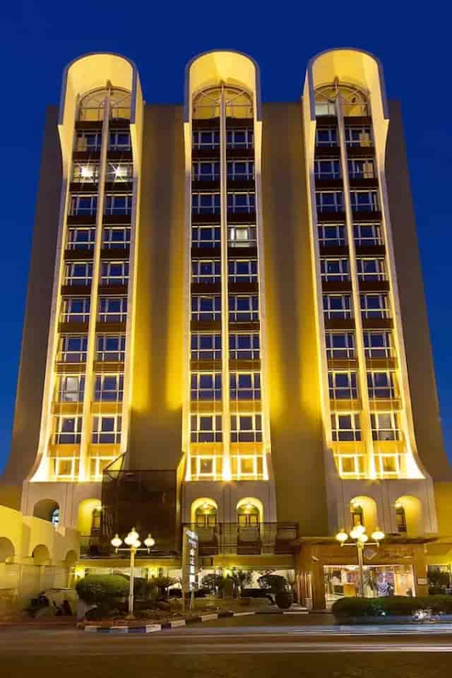Al Khaleej Palace Deira Hotel suite with classic decor for conference housing and group booking.