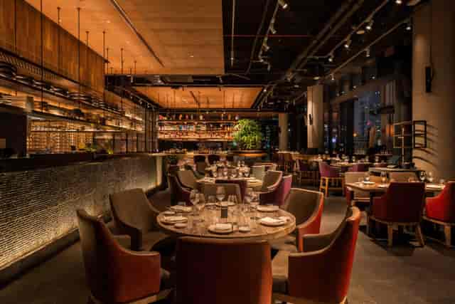 Clap Restaurant terrace, atmospheric upscale setting for corporate dinners and VIP networking.
