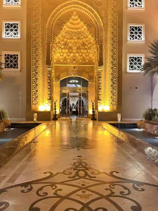 Amala Jumeirah Zabeel Saray opulent entrance with architectural lighting for VIP gala events.