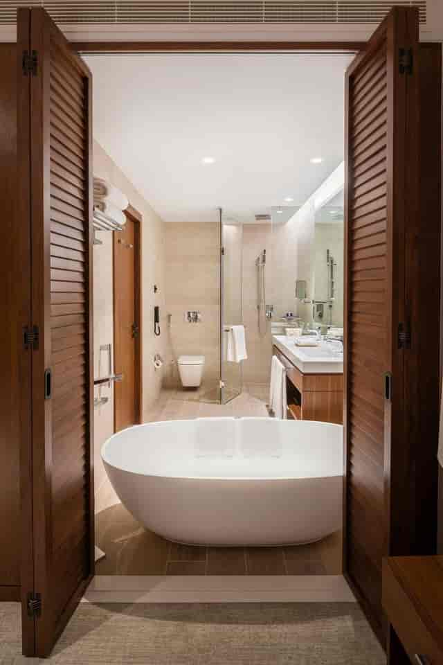 Luxury hotel ensuite with open-concept design for VIP guest blocks and executive retreats.