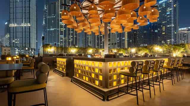 Upscale rooftop bar with skyline views for corporate cocktail receptions and VIP events.