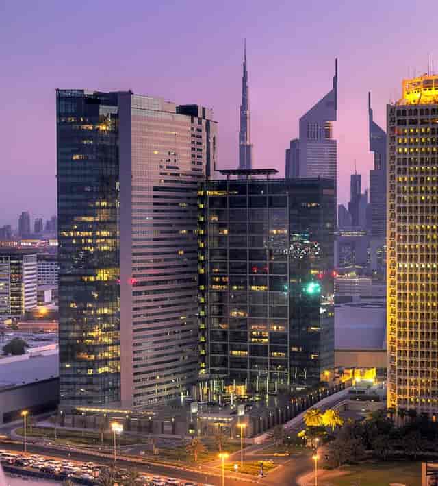 Olivine Jumeirah: Luxury corporate summit venue with panoramic metropolitan cityscape views.