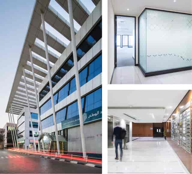 Modern corporate meeting room with glass partitions for executive offsites and business meetings.