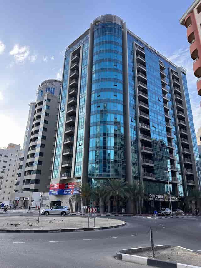 Icon Delux Hotel Apartments skyscraper for corporate business travel and extended-stay meetings.