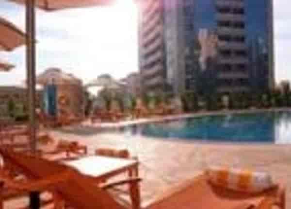 Outdoor pool area at TIME Oak Hotel & Suites, ideal for professional corporate events and receptions.