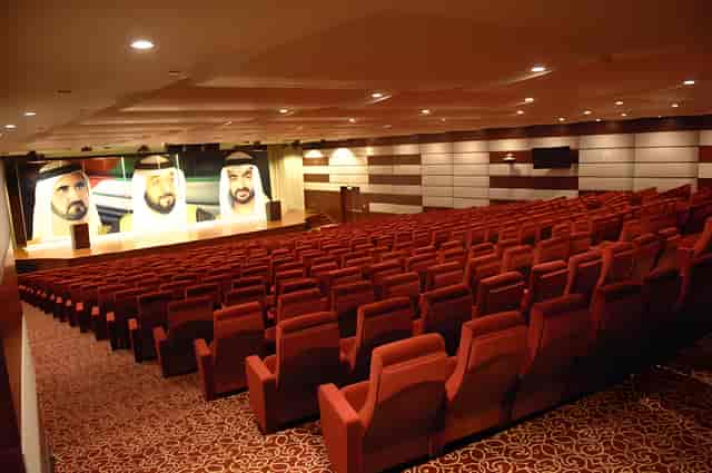 Zayed University convention hall with tiered seating for corporate conferences and presentations.