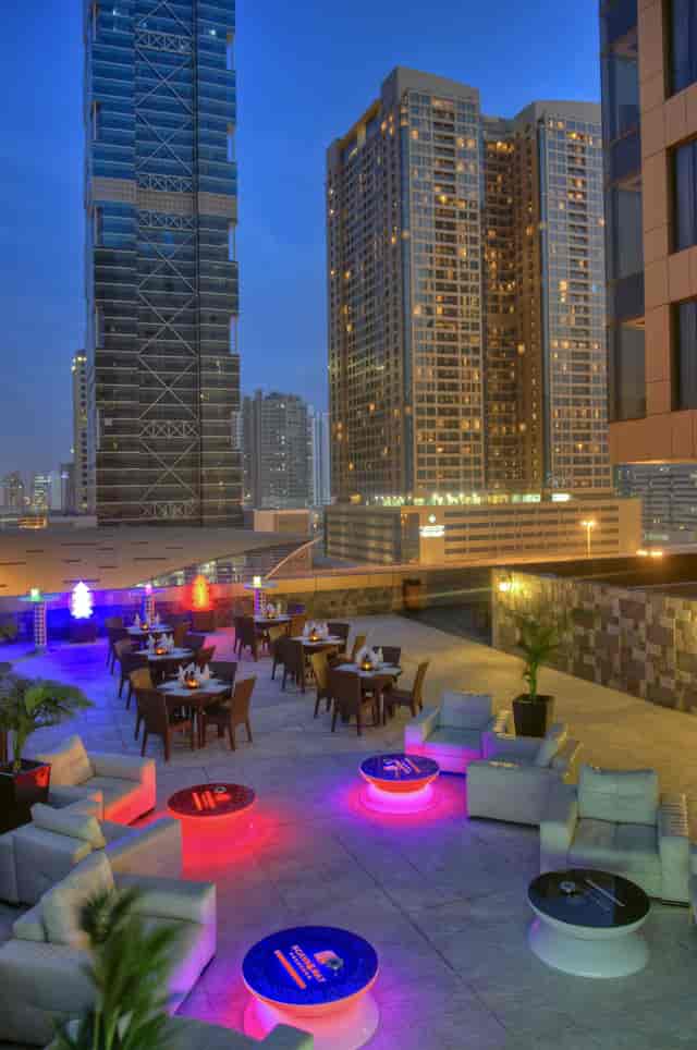 Rooftop lounge at Two Seasons Hotel, ideal for corporate cocktail hours and networking events.