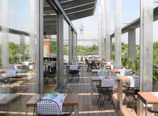 Terrazza Triennale rooftop venue with industrial architecture for corporate events and receptions.