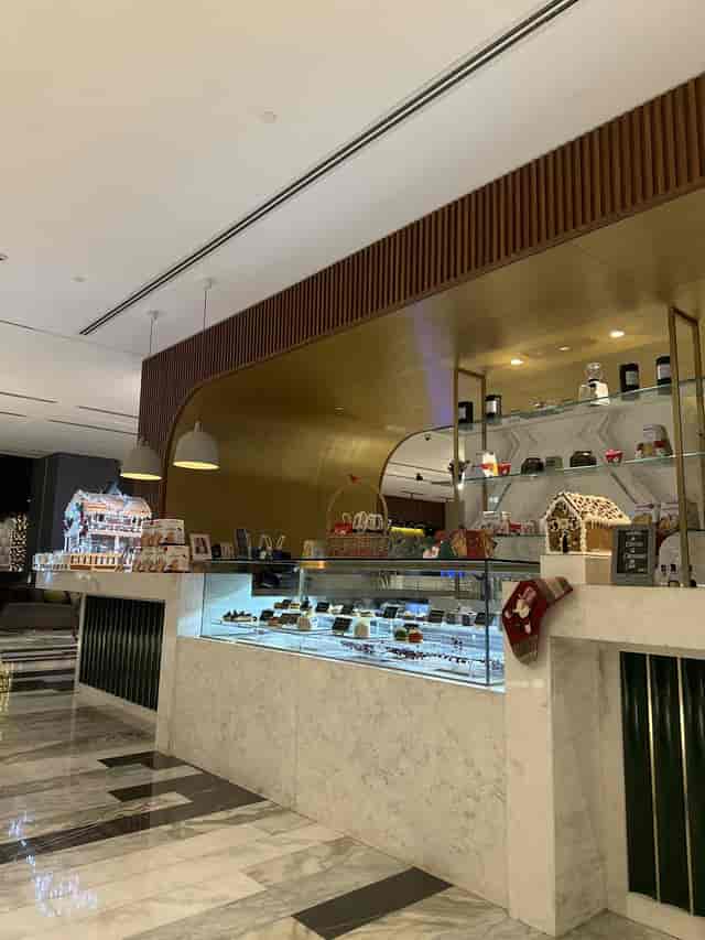 Al Fursan hotel lobby display for F&B events and luxury guest check-in activations.