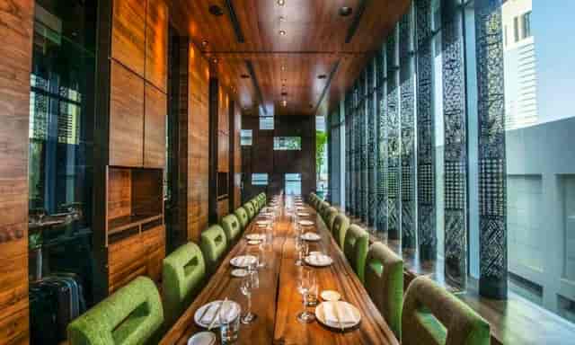 Private Dining Room 2: Boardroom-style table for executive meetings and upscale networking events.