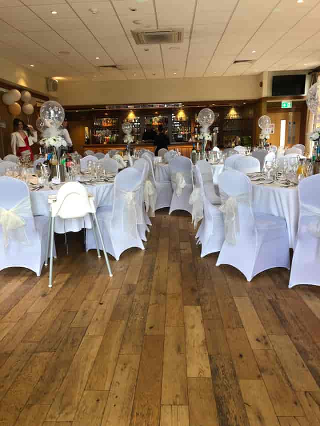 Emerald Room banquet setup with linen seating for event venue and reception planning.