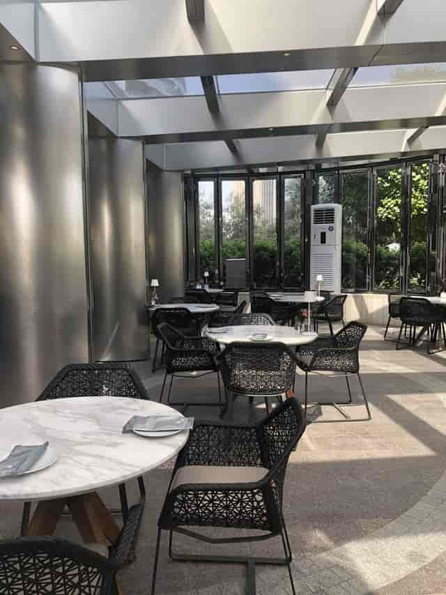Modern lounge with marble tables, ideal for corporate events and private functions.