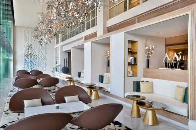 Modern lounge in The St. Regis Dubai for networking events and meetings.