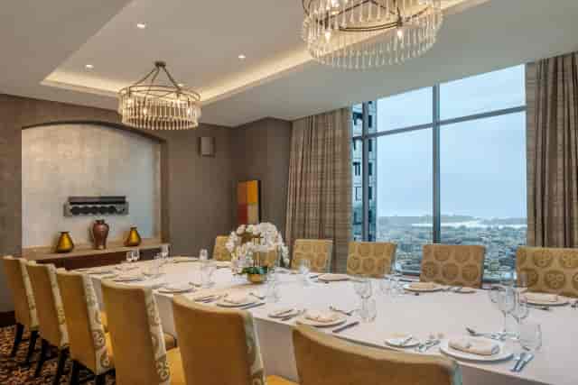 Elegant meeting room in The H Dubai's Royal Suite for corporate events and gatherings.